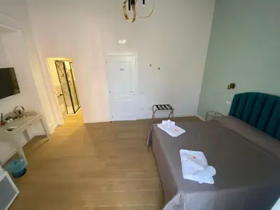 Letto o letti in una camera di Core Napoli 2 di Arianna Agrelli