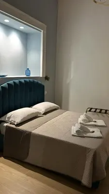 Letto o letti in una camera di Core Napoli 2 di Arianna Agrelli