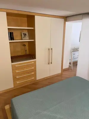 Letto o letti in una camera di Napolina House - Chiaia