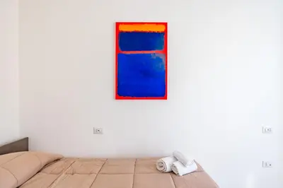 Letto o letti in una camera di Sunny Panoramic Apartment by Napoliapartments