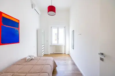 Letto o letti in una camera di Sunny Panoramic Apartment by Napoliapartments