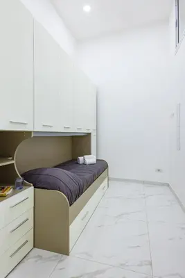 Letto o letti in una camera di Marcellino Comfort House by NapoliApartments