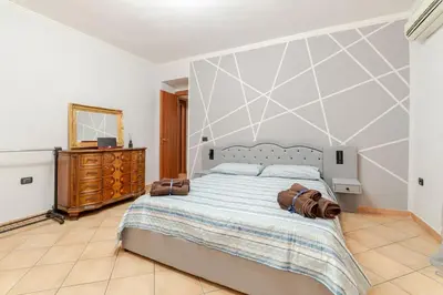 Letto o letti in una camera di NFA Nikyfigurellapartament