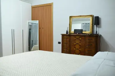 Letto o letti in una camera di NFA Nikyfigurellapartament