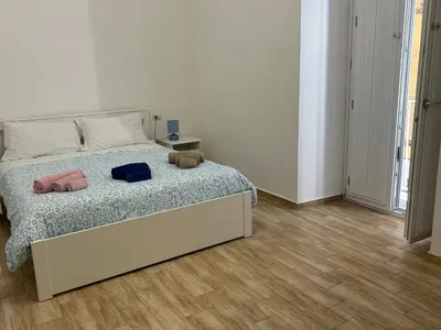 Letto o letti in una camera di Napoli centro