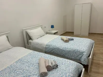Letto o letti in una camera di Giordy house Napoli Centro