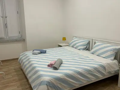 Letto o letti in una camera di Giordy house Napoli Centro