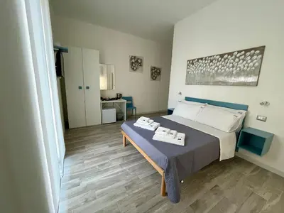 Letto o letti in una camera di Prospettiva Medina