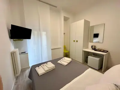 Letto o letti in una camera di Prospettiva Medina
