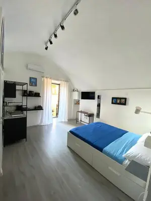 Letto o letti in una camera di La Casa di Partenope