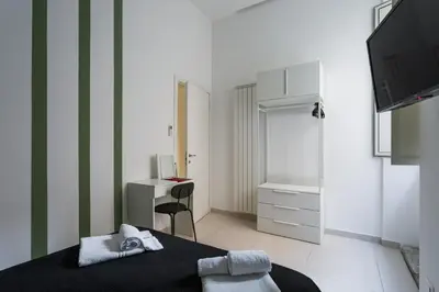 Letto o letti in una camera di Casa Papaccio Apartment & Spa By Dimorra
