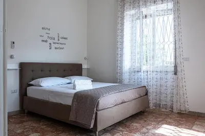 Letto o letti in una camera di Casa Tramonti