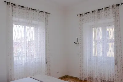 Letto o letti in una camera di Casa Tramonti