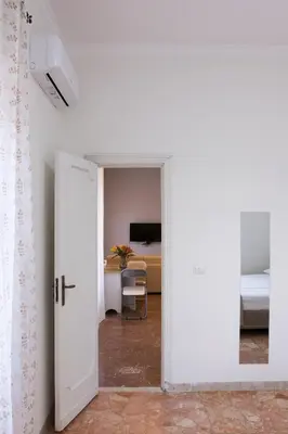 Letto o letti in una camera di Casa Tramonti