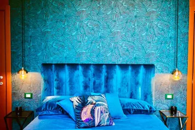 Letto o letti in una camera di Relais Del Gesu, Napoli centro storico