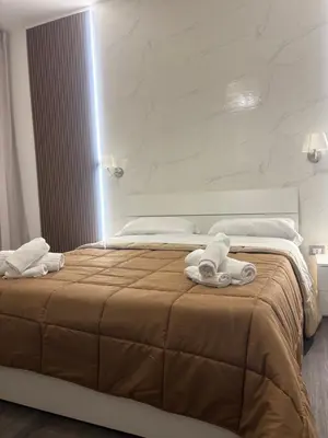 Letto o letti in una camera di For House