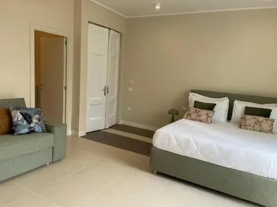 Letto o letti in una camera di Residenza Sansevero - Dimore Partenopee