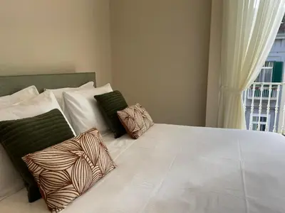 Letto o letti in una camera di Residenza Sansevero - Dimore Partenopee
