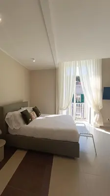 Letto o letti in una camera di Residenza Sansevero - Dimore Partenopee