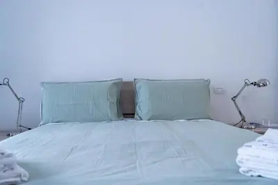 Letto o letti in una camera di LemonHouse