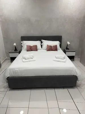 Letto o letti in una camera di La corte dei decumani