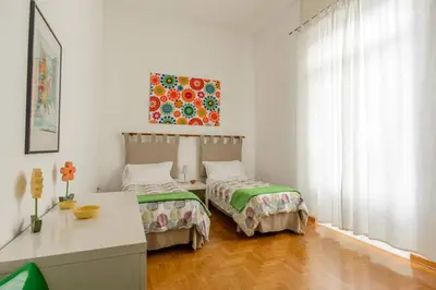 Letto o letti in una camera di Casa Michelangelo