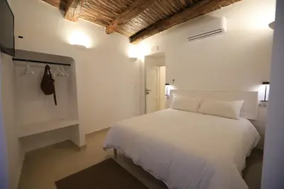 Letto o letti in una camera di Ai 13 Gradoni di Chiaia