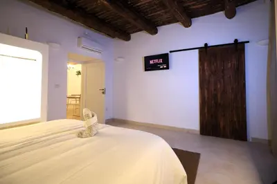Letto o letti in una camera di Ai 13 Gradoni di Chiaia