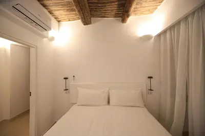 Letto o letti in una camera di Ai 13 Gradoni di Chiaia