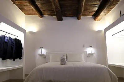 Letto o letti in una camera di Ai 13 Gradoni di Chiaia