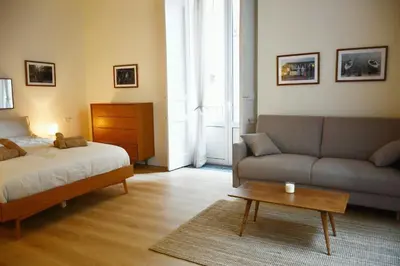 Letto o letti in una camera di Casa Vayu - Quartieri Spagnoli