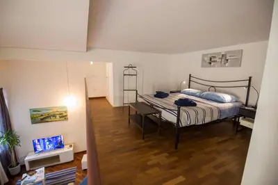 Letto o letti in una camera di NapoliStayIn Central Flat in Naples