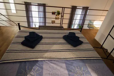 Letto o letti in una camera di NapoliStayIn Central Flat in Naples