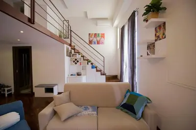 Area soggiorno di NapoliStayIn Central Flat in Naples