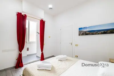 Letto o letti in una camera di FlowerPower By DomusExtra