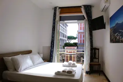 Letto o letti in una camera di Punto Felice Riviera - Centro Città Lungomare Caracciolo