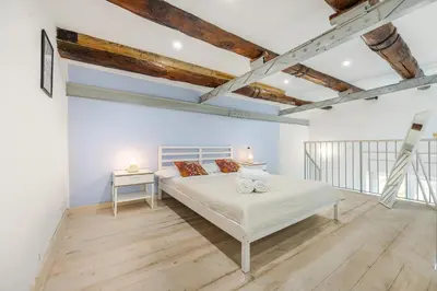Letto o letti in una camera di NaLusa rooms - in centro a Toledo