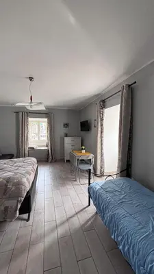Letto o letti in una camera di La Finestra Di Dante