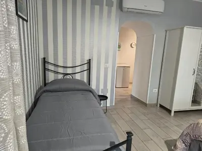 Letto o letti in una camera di La Finestra Di Dante