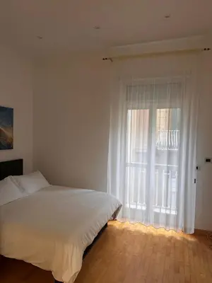 Letto o letti in una camera di La bella vita a Chiaia