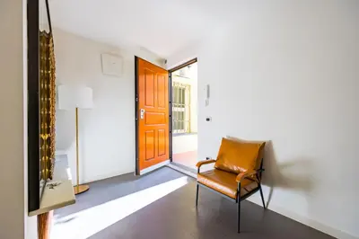 Area soggiorno di DUOMO TERRACE - Luxury Apartment with Private Parking in Naples Historic Center