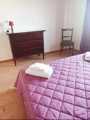 Letto o letti in una camera di Vesuvio&Partenope
