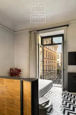 Letto o letti in una camera di Unicum Suite Grande Archivio Napoli Centro Storico
