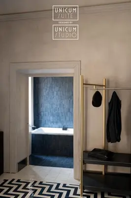 Letto o letti in una camera di Unicum Suite Grande Archivio Napoli Centro Storico