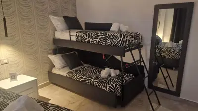 Letto o letti in una camera di B&B Murolo's Home