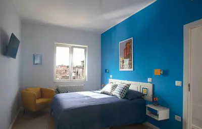 Letto o letti in una camera di Belvedere Quartieri Napoli