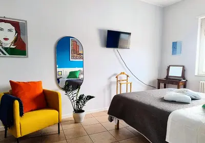 Letto o letti in una camera di Belvedere Quartieri Napoli