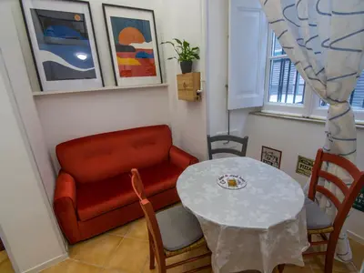 Area soggiorno di Duomo Porto University Suite