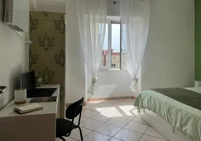Letto o letti in una camera di Rosemary s House-Vomero, Metro &Parking