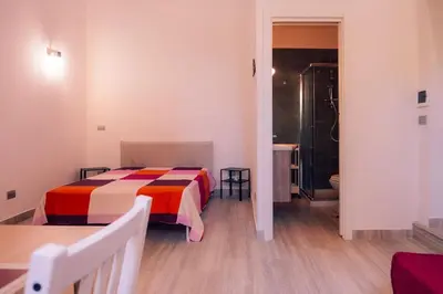 Letto o letti in una camera di santacroce guest house